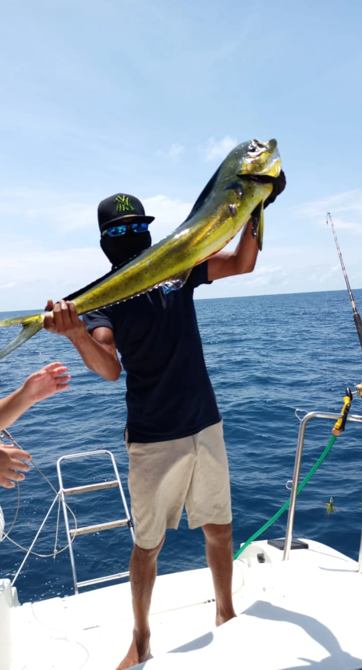 Trolling fishing rod aboard a private catamaran sailing near El Arco in Cabo San Lucas